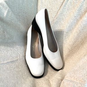 Salvatore Ferragamo cream wedges.